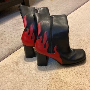 Brand new Harley-Davididson zip up ankle boot.  Black with red flames.